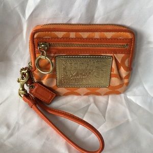 Coach Poppy zippered wristlet